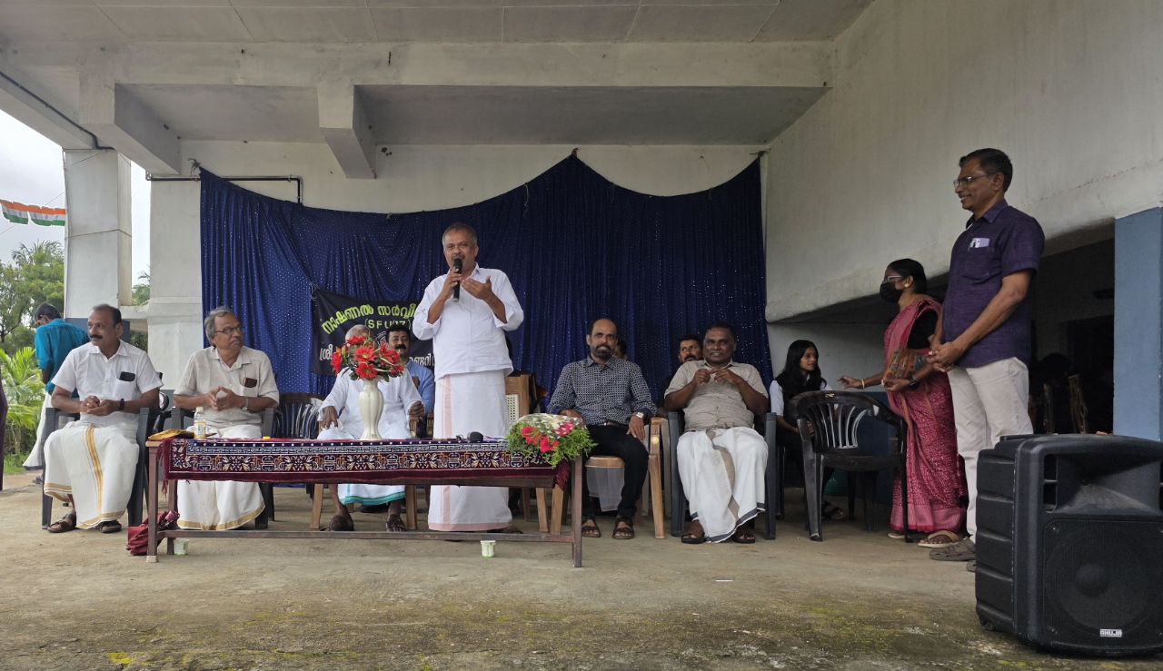 Manager interacting with students