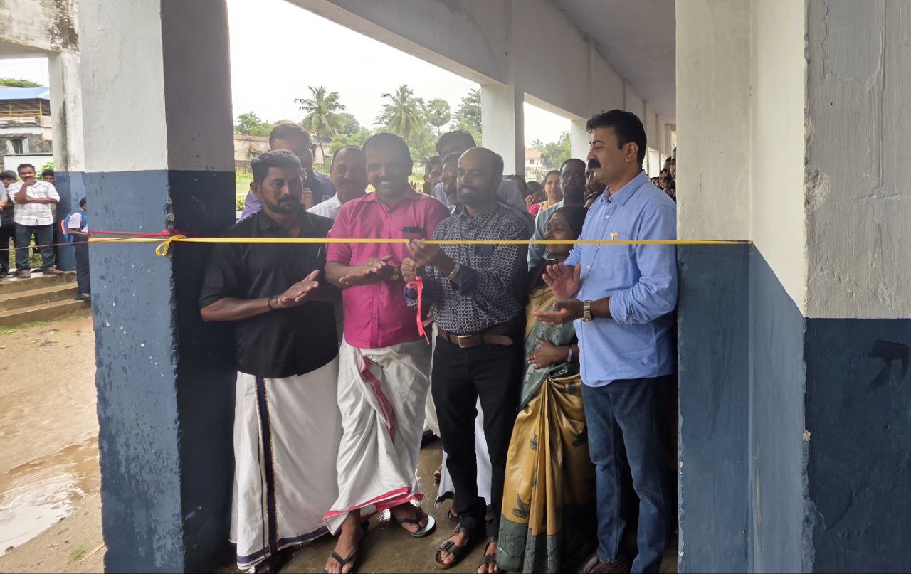 Retired Head Master inaugurating water purifier